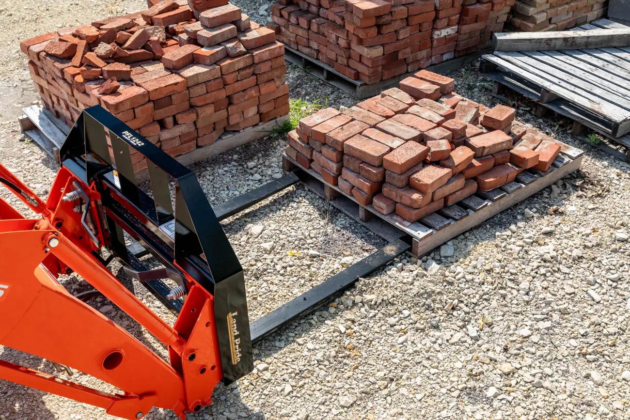 PFL1242 Forks picking up a pallet